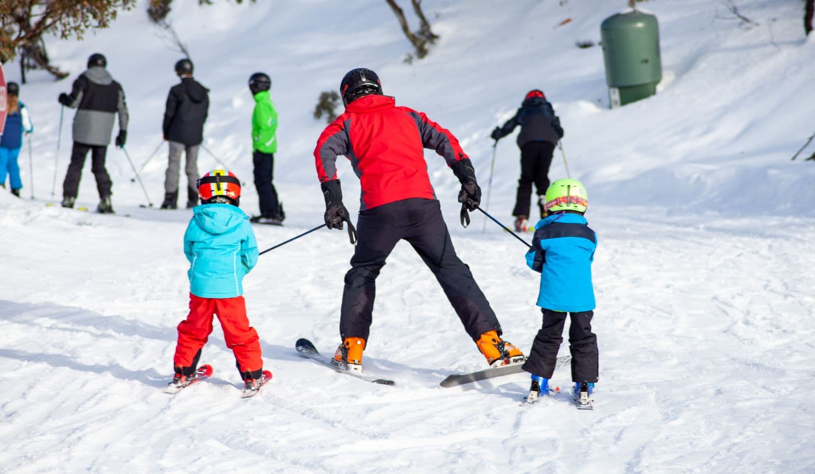 Group ski lesson on a snow-covered mountain