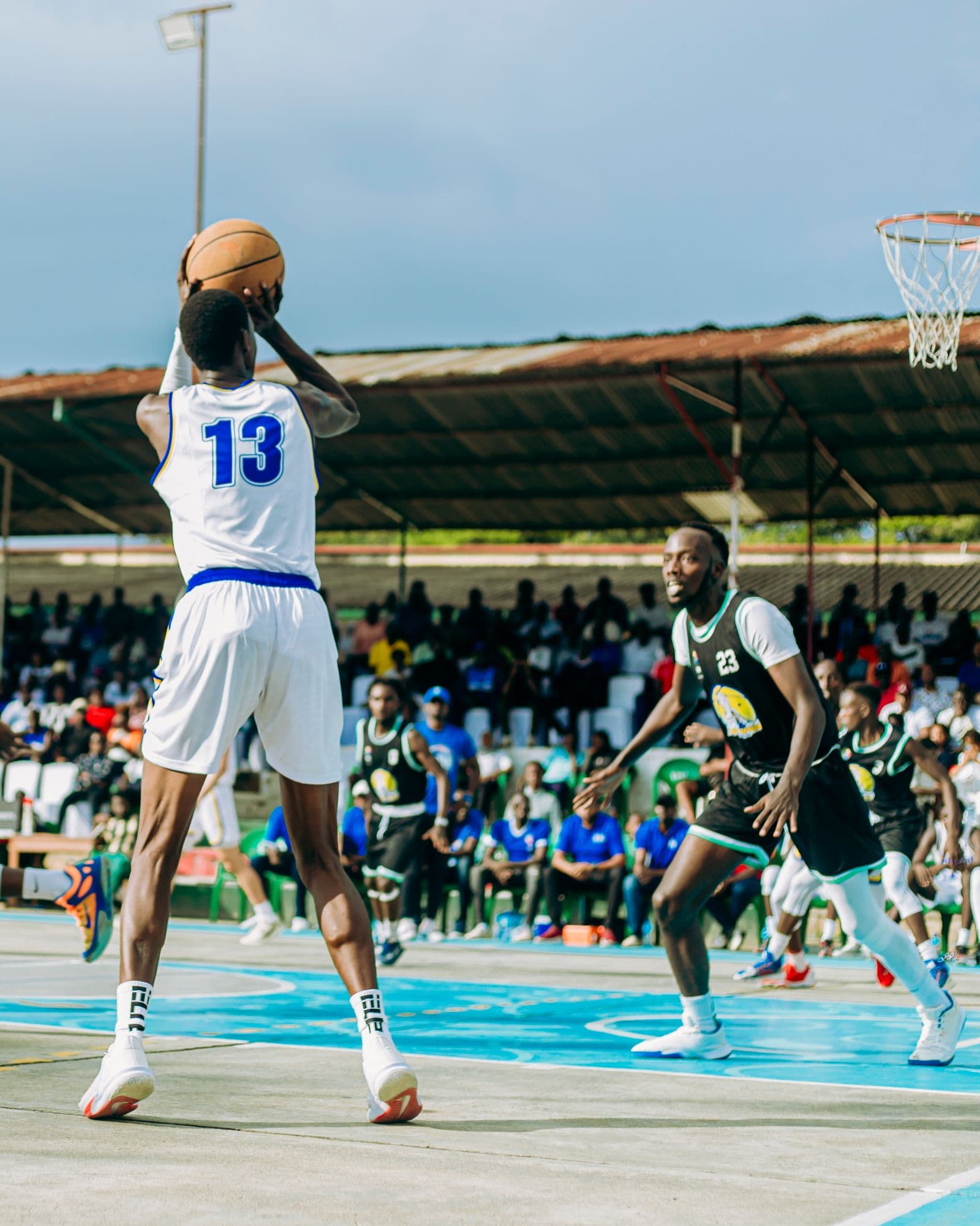 Player rising for a shot in an outdoor game