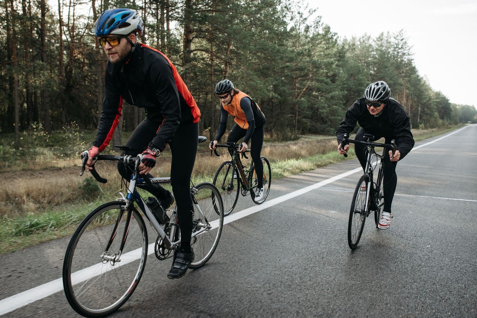 Three cyclists enjoying an easy scenic ride