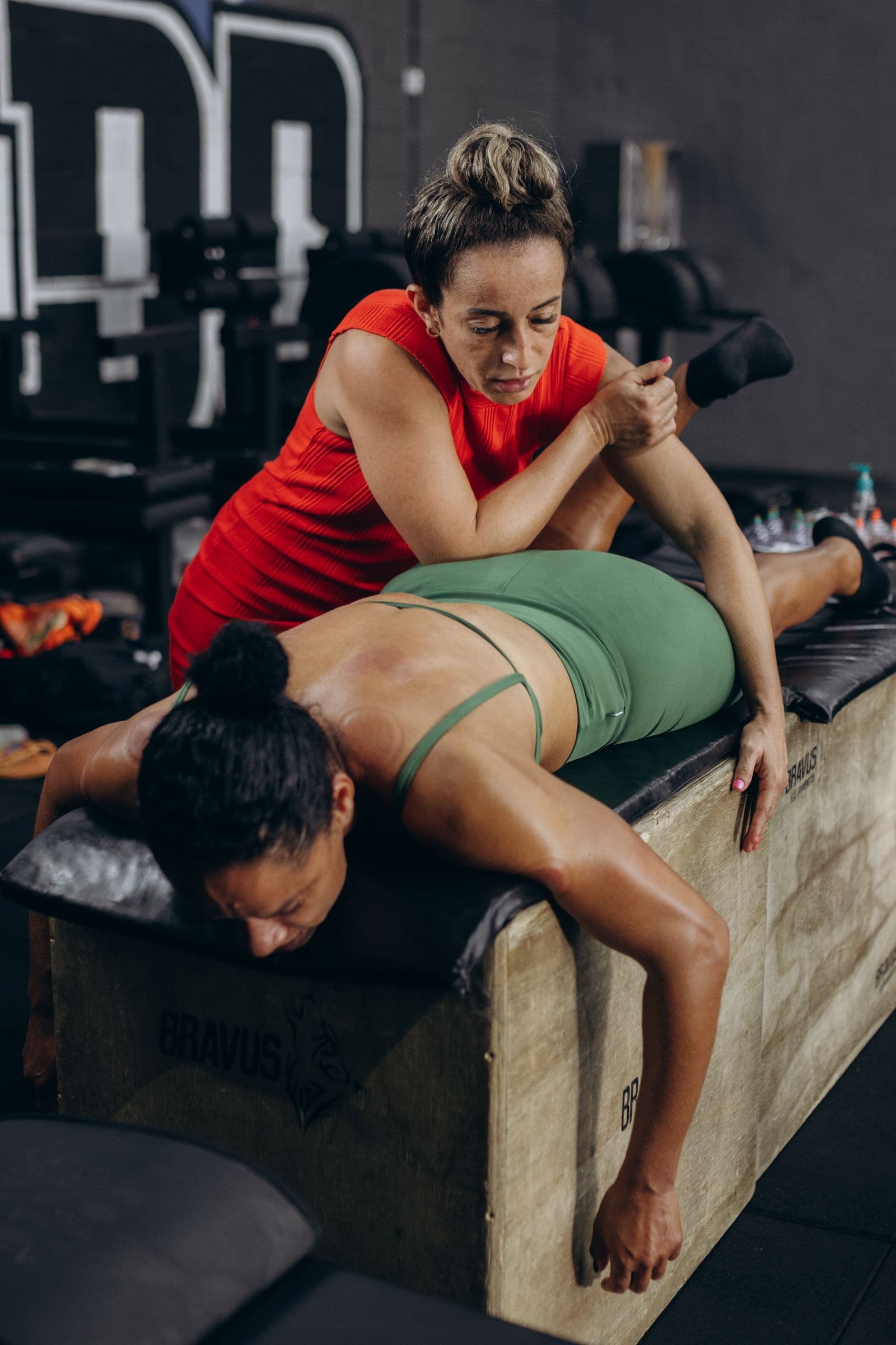 Therapist working with a patient on hip and back mobility